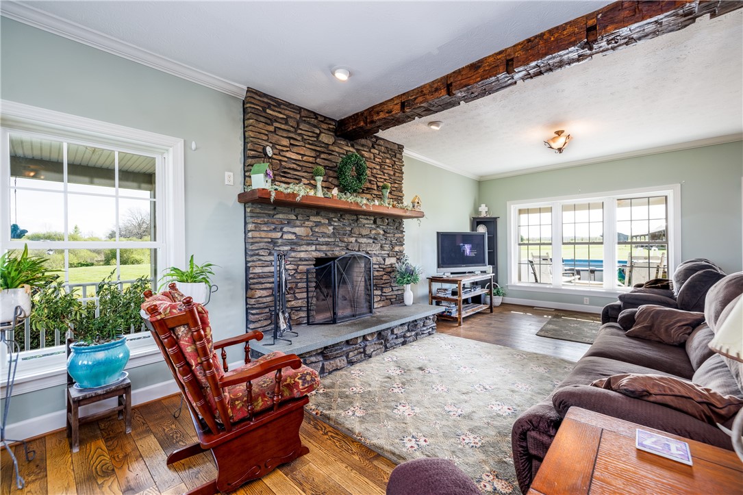 4128 River Road York, NY 14533 - Photo 18 of 50 STONE FIREPLACE GREAT ROOM