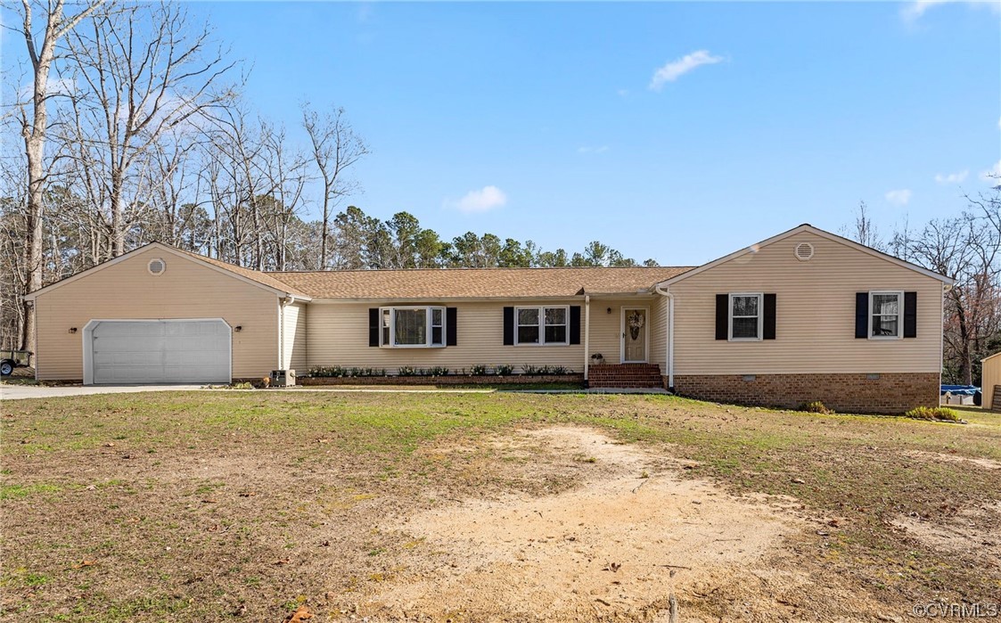 17543 Le Master Road Petersburg, VA 23803 - Photo 2 of 49 a view of a yard in front of the house