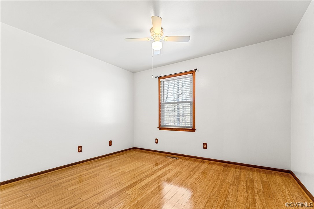 17543 Le Master Road Petersburg, VA 23803 - Photo 25 of 49 wooden floor in an empty room with a window