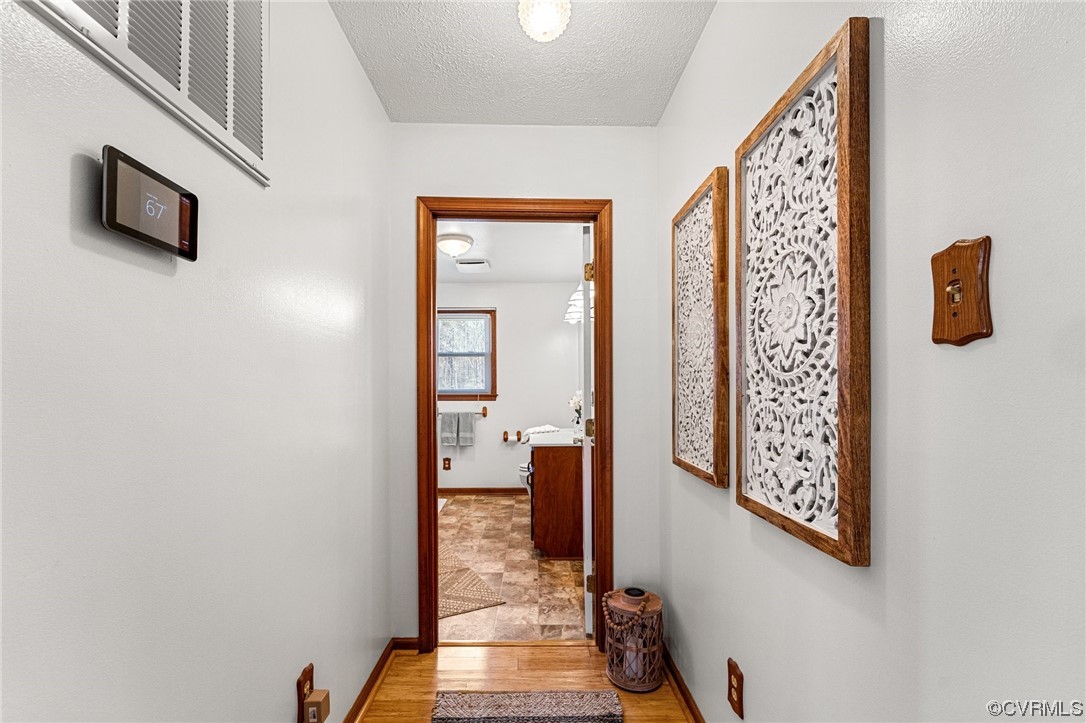 17543 Le Master Road Petersburg, VA 23803 - Photo 27 of 49 a view of a hallway with furniture and entryway