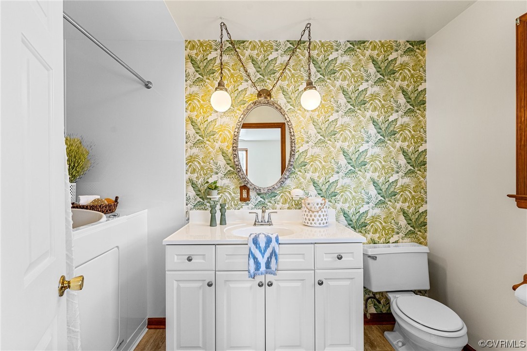 17543 Le Master Road Petersburg, VA 23803 - Photo 33 of 49 a bathroom with a sink mirror vanity and toilet