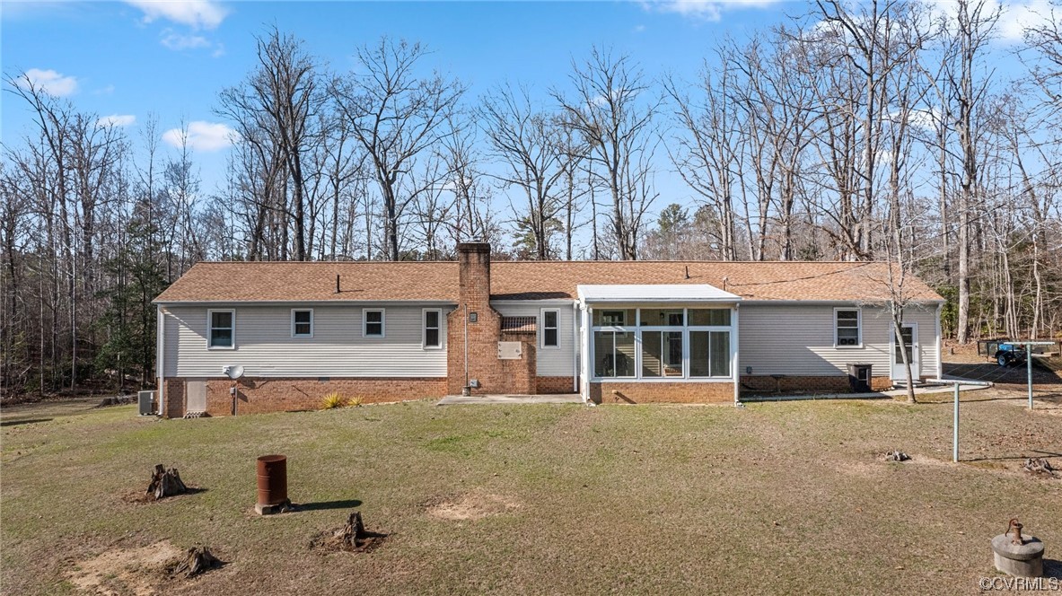 17543 Le Master Road Petersburg, VA 23803 - Photo 38 of 49 a front view of a house with a yard