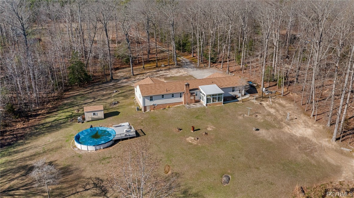 17543 Le Master Road Petersburg, VA 23803 - Photo 39 of 49 a view of a backyard with table and chairs