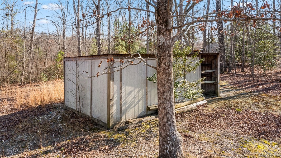 17543 Le Master Road Petersburg, VA 23803 - Photo 47 of 49 a view of a pathway of a house with wooden fence