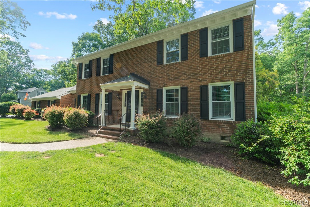 5500 Krag Road Chester, VA 23831 - Photo 3 of 49 front view of a house with a yard