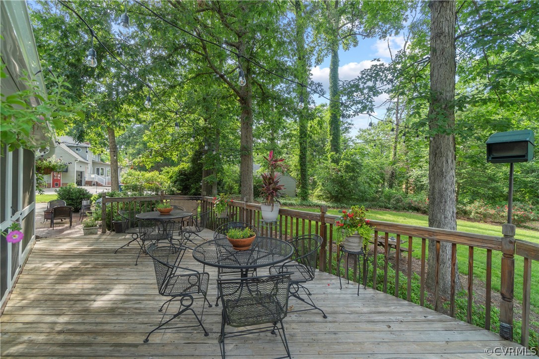 5500 Krag Road Chester, VA 23831 - Photo 46 of 49 a view of a table and chairs on the roof deck