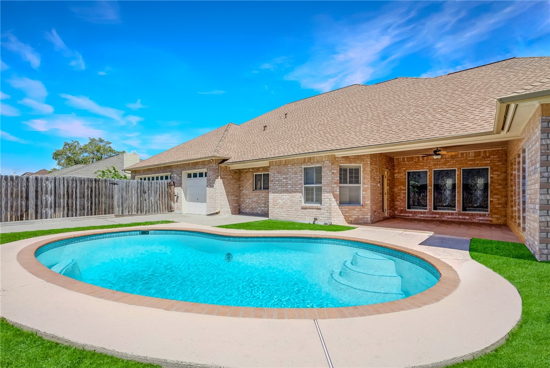 5917 Harvest Hill Road Corpus Christi, TX 78414 - Photo 4 of 40 a view of a house with swimming pool and porch