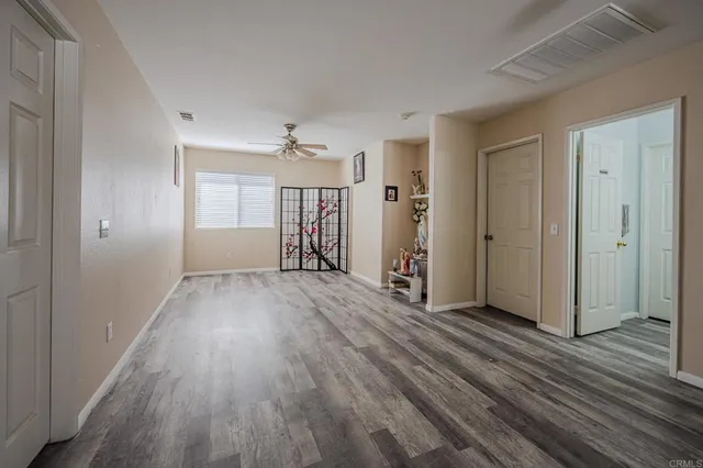 a view of a livingroom with wooden floor