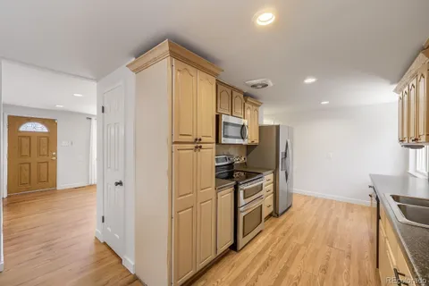 $699,000 | 1640 Buchtel Boulevard South, Denver, CO 80210