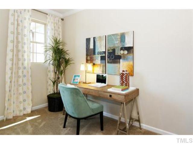 717 Wickham Ridge Road Apex, NC 27539 - Photo 15 of 25 a dining room with furniture and window