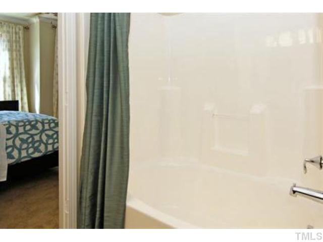 717 Wickham Ridge Road Apex, NC 27539 - Photo 17 of 25 a view of walk in closet