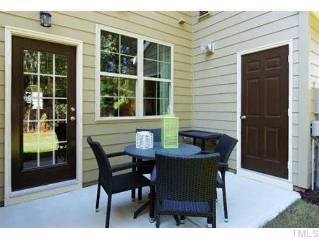 717 Wickham Ridge Road Apex, NC 27539 - Photo 18 of 25 a dining room with furniture and window