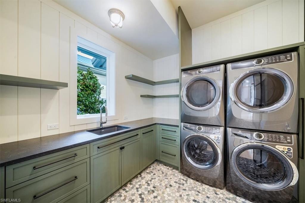 508 16th Avenue South Naples, FL 34102 - Photo 14 of 43 Laundry room with two stackable washer/dryers.