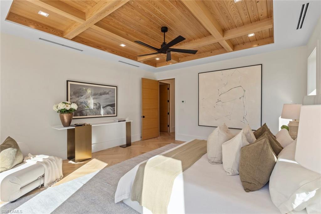 508 16th Avenue South Naples, FL 34102 - Photo 20 of 50 Bedroom with a wooden ceiling with exposed beams, ceiling fan, and coffered ceiling