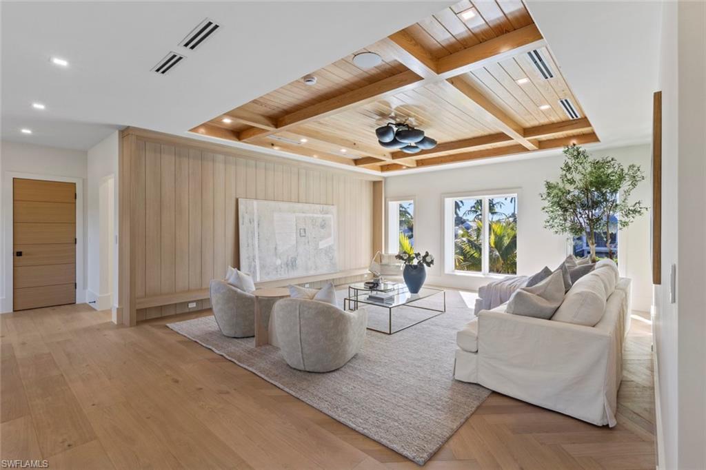 508 16th Avenue South Naples, FL 34102 - Photo 36 of 50 Living area featuring coffered ceiling and a wood ceiling with exposed beams