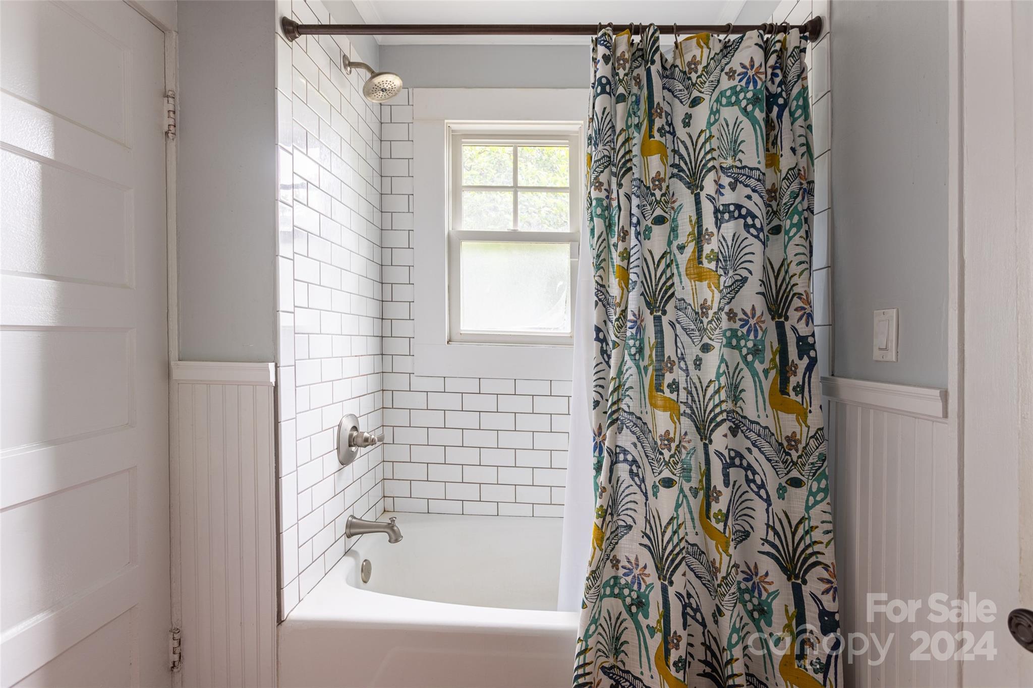 1624 Club Road Charlotte, NC 28205 - Photo 17 of 23 a bathroom with a bathtub and shower