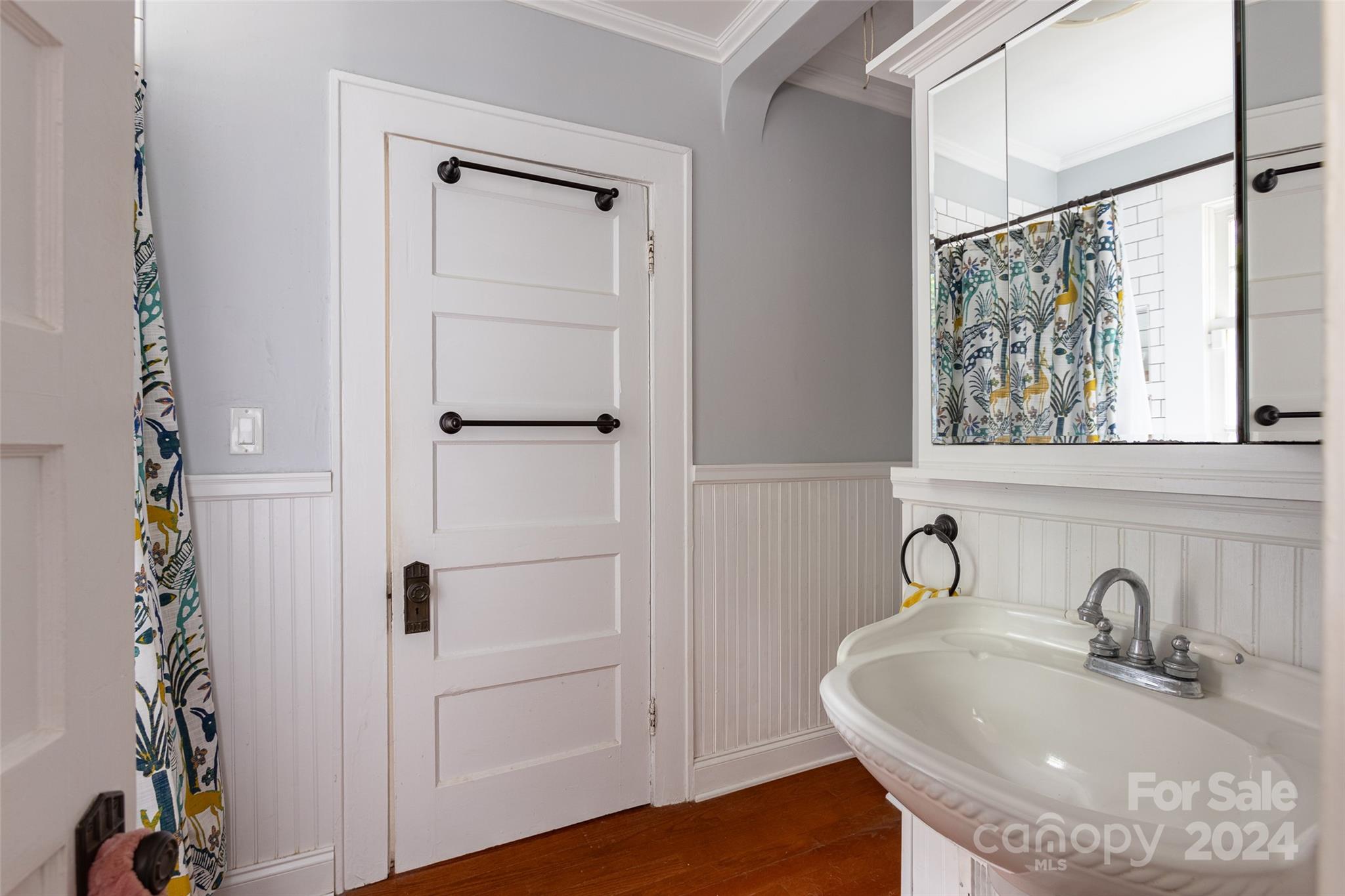 1624 Club Road Charlotte, NC 28205 - Photo 18 of 23 a bathroom with a sink and a mirror