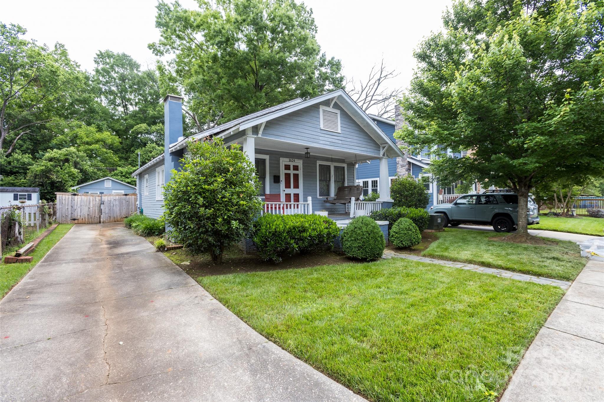 1624 Club Road Charlotte, NC 28205 - Photo 2 of 23 a view of a house with a yard and pathway