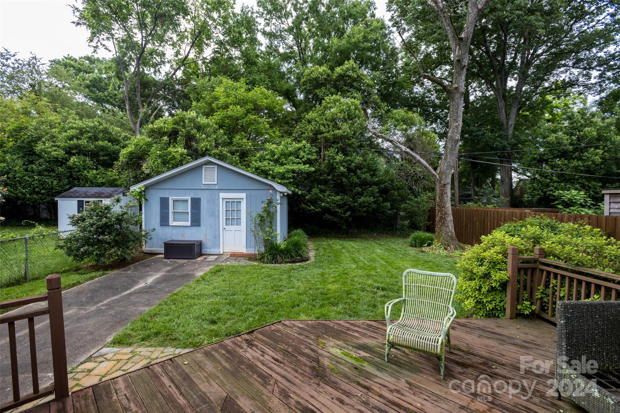 1624 Club Road Charlotte, NC 28205 - Photo 22 of 23 a front view of a house with garden
