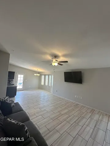 a kitchen with stainless steel appliances granite countertop a stove a sink dishwasher a refrigerator and cabinets