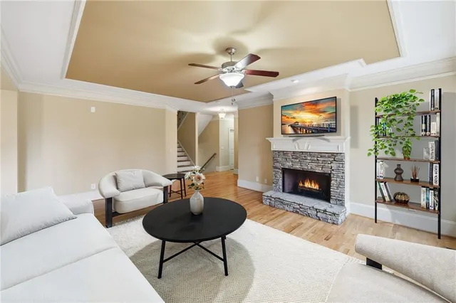 a living room with a fireplace and a fireplace