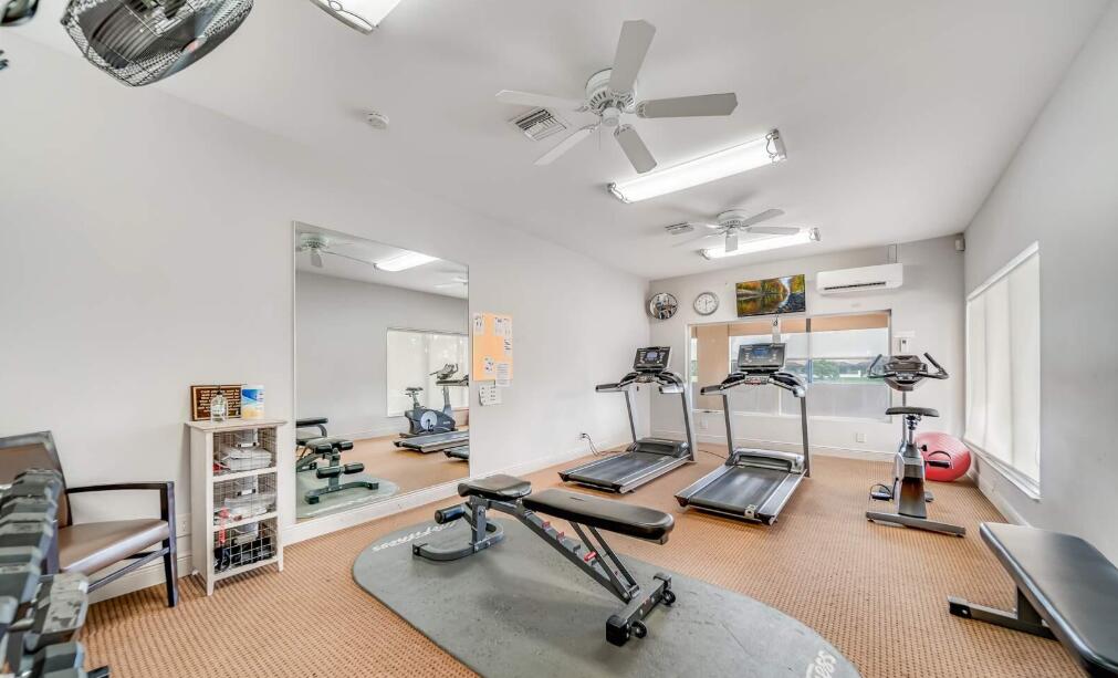 20020 Rima Circle Boca Raton, FL 33434 - Photo 13 of 26 a view of a livingroom with workspace and a window