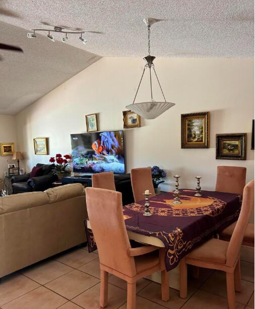 20020 Rima Circle Boca Raton, FL 33434 - Photo 19 of 26 a view of a dining room with furniture