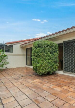 20020 Rima Circle Boca Raton, FL 33434 - Photo 26 of 26 a front view of a house with a garden