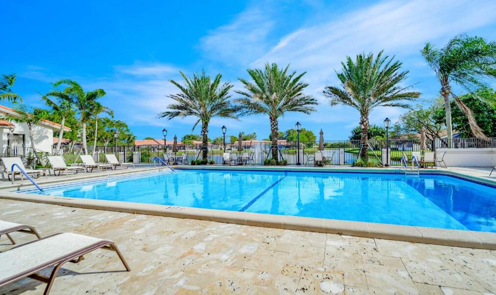 20020 Rima Circle Boca Raton, FL 33434 - Photo 4 of 26 a view of a backyard patio with swimming pool
