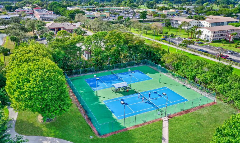 20020 Rima Circle Boca Raton, FL 33434 - Photo 8 of 26 an aerial view of a pool yard and mountain view in back