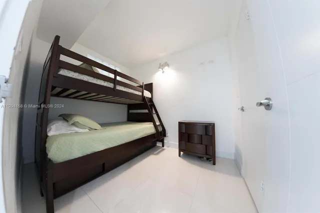 a bedroom with bunk bed