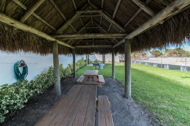 a view of yard with patio