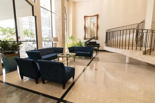 a view of staircase with a rug