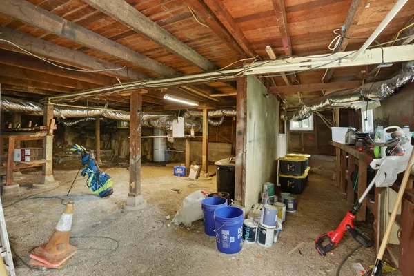 a view of a house with a yard and garden