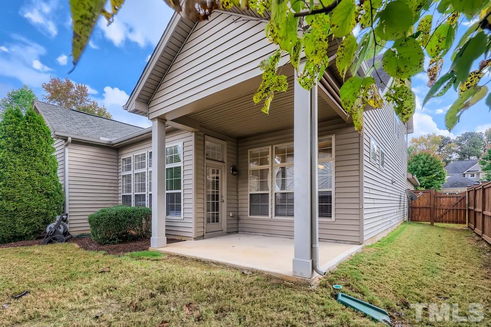 7809 Berry Crest Avenue Raleigh, NC 27617 - Photo 24 of 27 a house view with a outdoor space