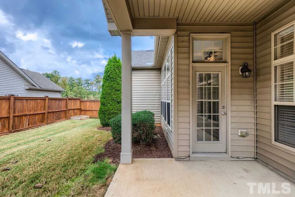 7809 Berry Crest Avenue Raleigh, NC 27617 - Photo 25 of 27 a view of a backyard