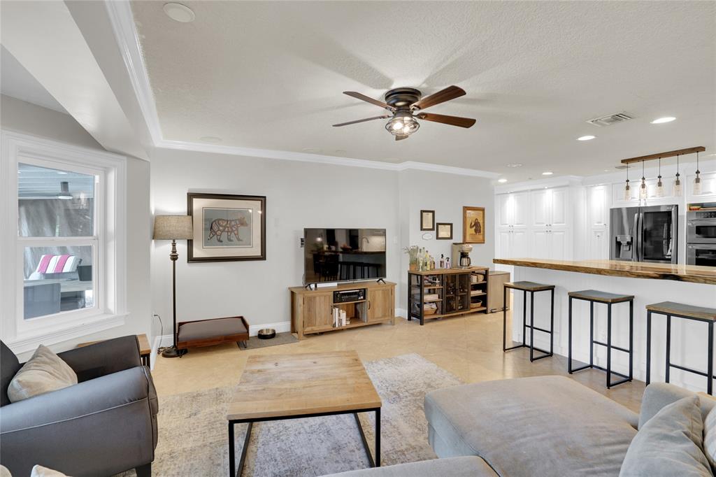 Southwest Ranches Southwest Ranches, FL 33331 - Photo 12 of 50 a living room with furniture and a flat screen tv with wooden floor
