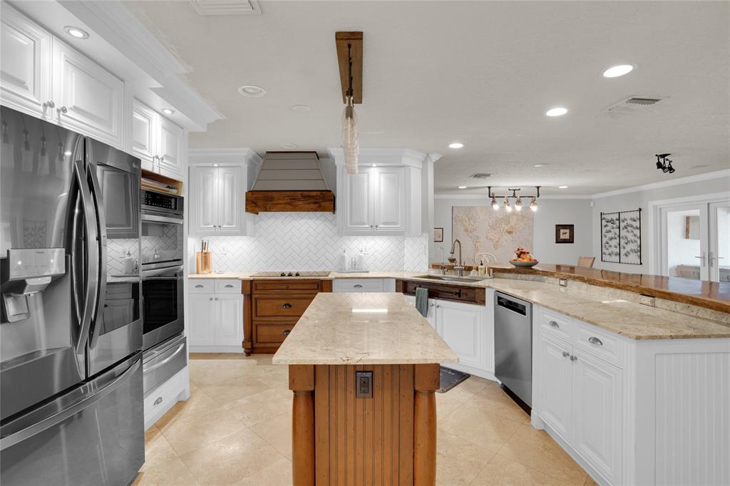 Southwest Ranches Southwest Ranches, FL 33331 - Photo 15 of 50 a kitchen with a sink stove and refrigerator