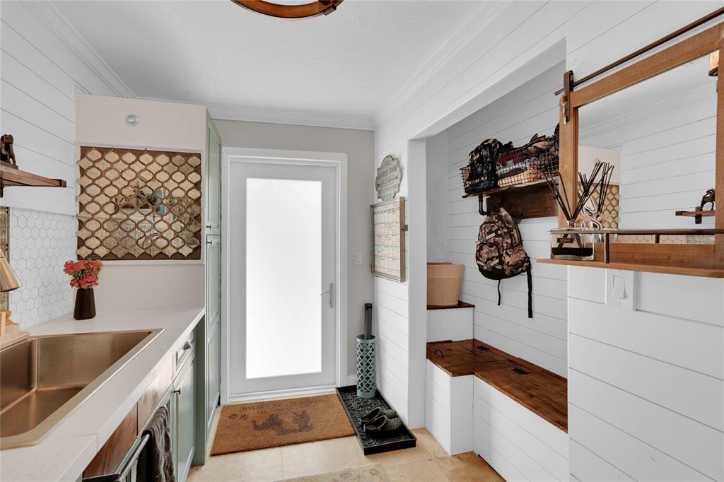 Southwest Ranches Southwest Ranches, FL 33331 - Photo 19 of 50 a kitchen with a sink and a stove top oven