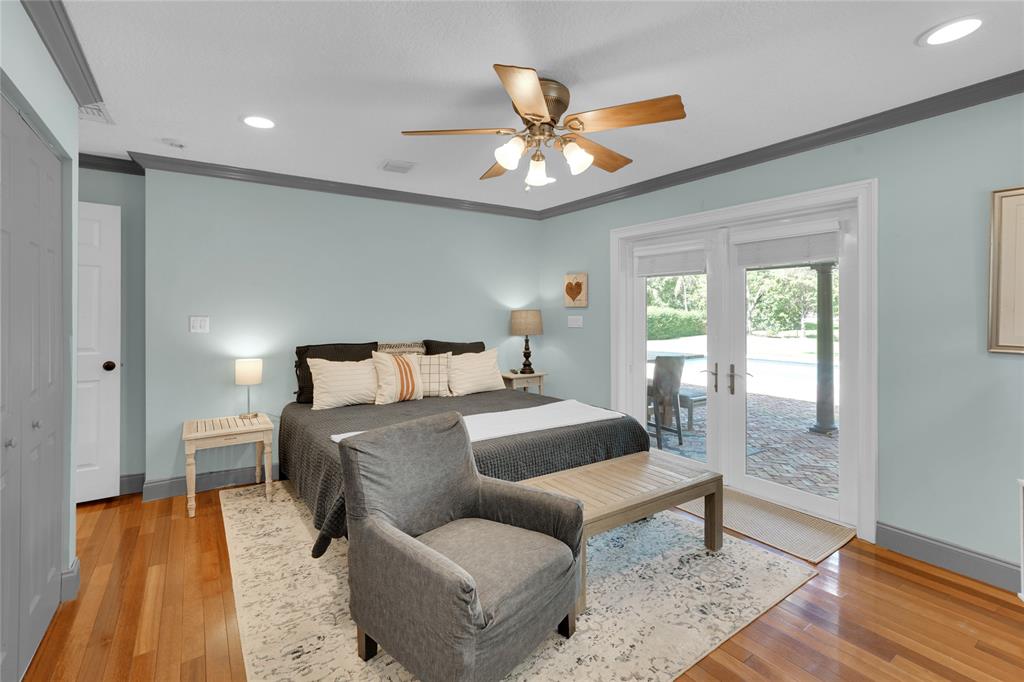 Southwest Ranches Southwest Ranches, FL 33331 - Photo 23 of 50 a bedroom with furniture and a large window