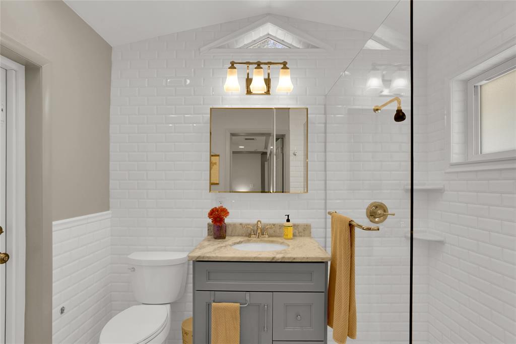 Southwest Ranches Southwest Ranches, FL 33331 - Photo 24 of 50 a bathroom with a granite countertop sink toilet and a mirror