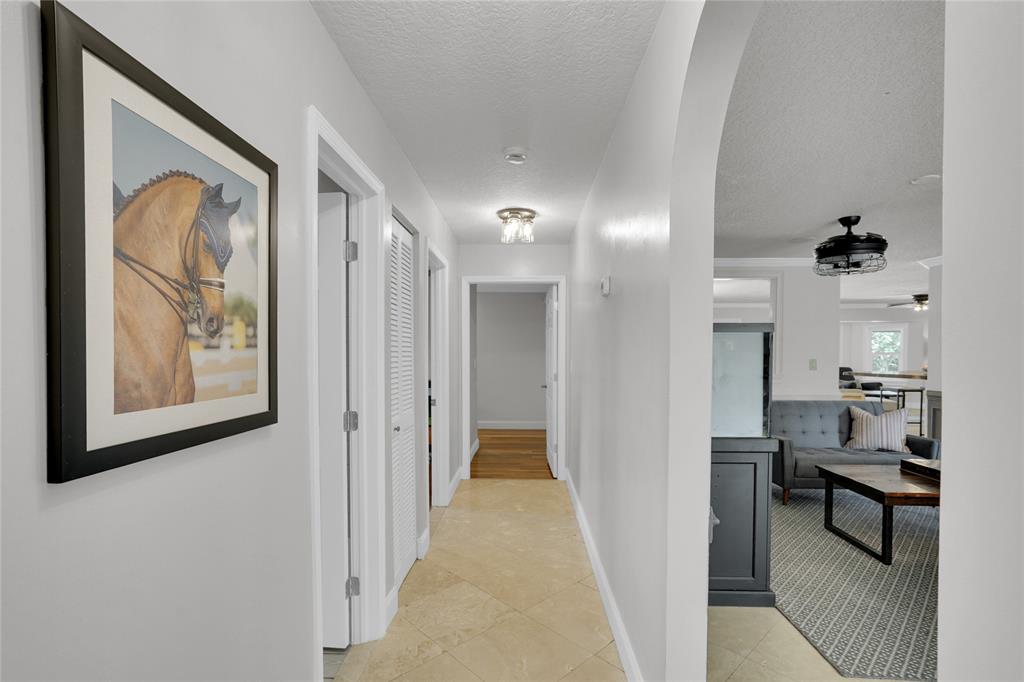 Southwest Ranches Southwest Ranches, FL 33331 - Photo 28 of 50 a view of a hallway with wooden shelves