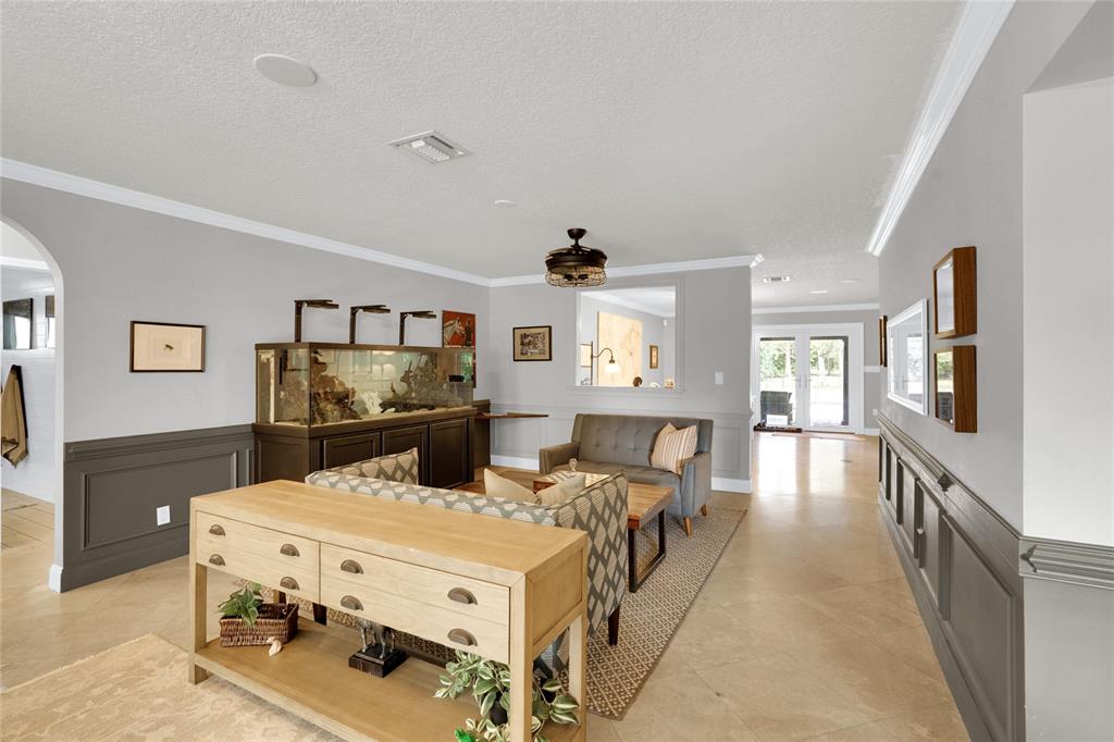 Southwest Ranches Southwest Ranches, FL 33331 - Photo 4 of 50 a living room with furniture and flat screen tv