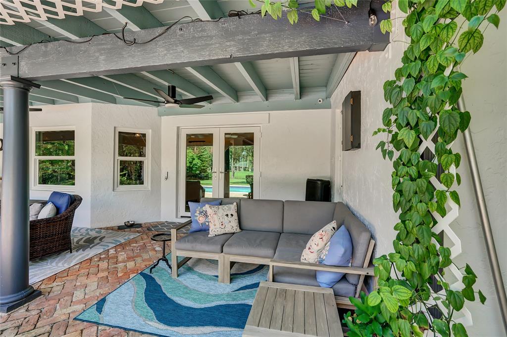 Southwest Ranches Southwest Ranches, FL 33331 - Photo 41 of 50 a roof deck with couches and potted plants
