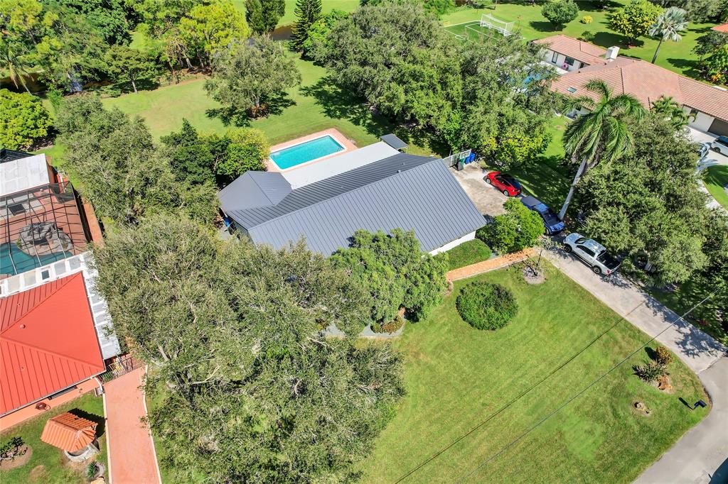 Southwest Ranches Southwest Ranches, FL 33331 - Photo 50 of 50 an aerial view of a house with a yard and tennis court
