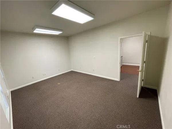 an empty room with a workbench