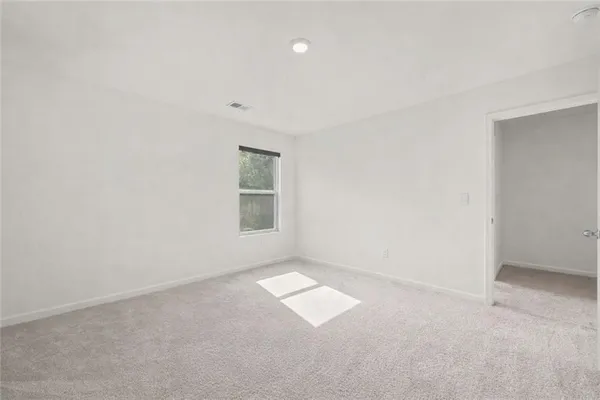 an empty room with windows