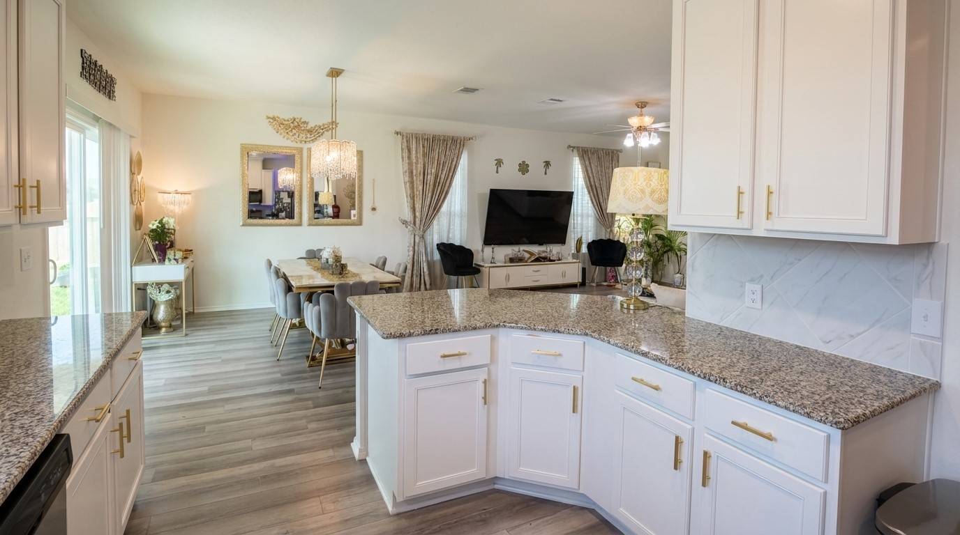 308 Los Cobos Lane Georgetown, TX 78626 - Photo 11 of 31 a kitchen with white cabinets and sink