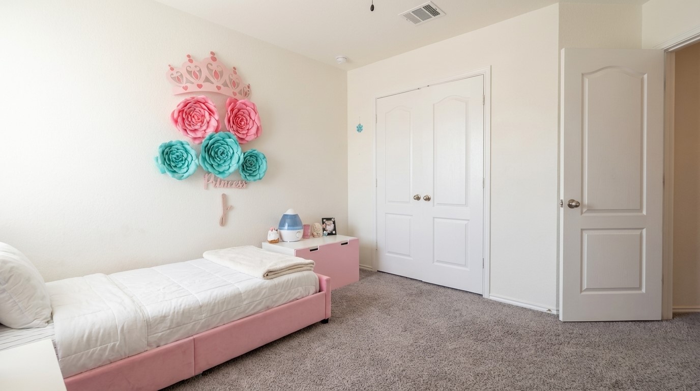 308 Los Cobos Lane Georgetown, TX 78626 - Photo 29 of 31 a bedroom with a bed and a painting on the wall