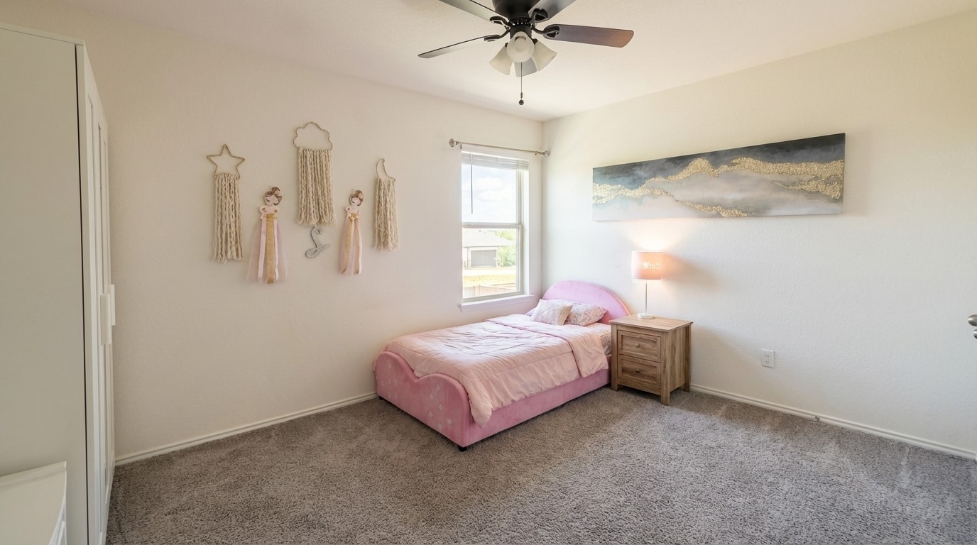 308 Los Cobos Lane Georgetown, TX 78626 - Photo 30 of 31 a bedroom with a bed and a window